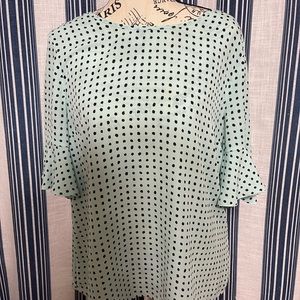 Elle mint polka dot blouse.